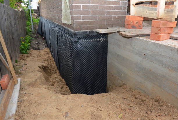 SJ Waterproofing Pros technician performing targeted Waterproofing assessment in Rawson, OH